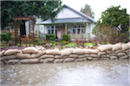 Sandbags piled in front of a door